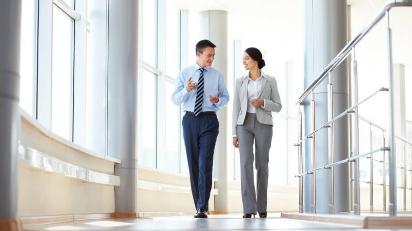 two financial investors walking