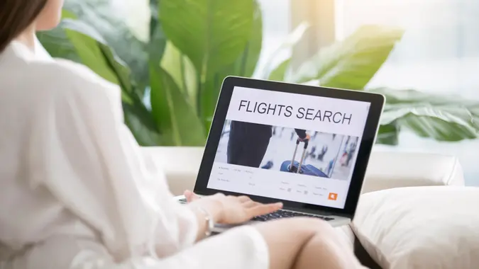 woman searching for flights