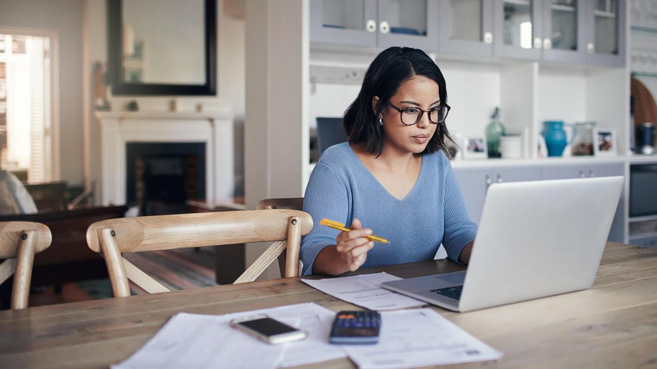 woman working on finances at home