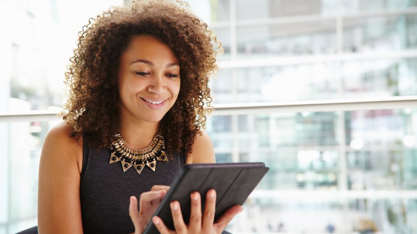 woman working on ipad