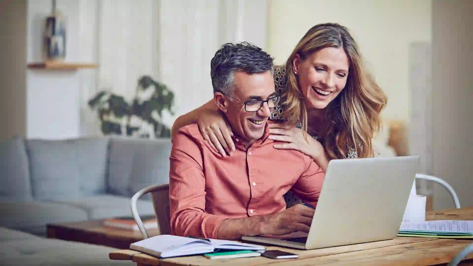 Mature couple using a laptop
