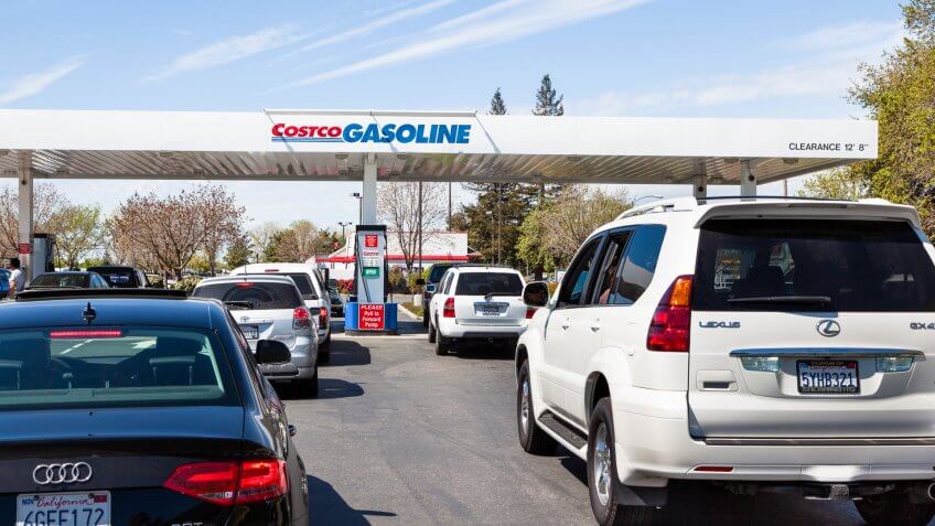 Rancho Cordova, California, USA - April 5, 2011: Vehicles waiting in multiple lines for the gasoline at Costco, members only, gas station.