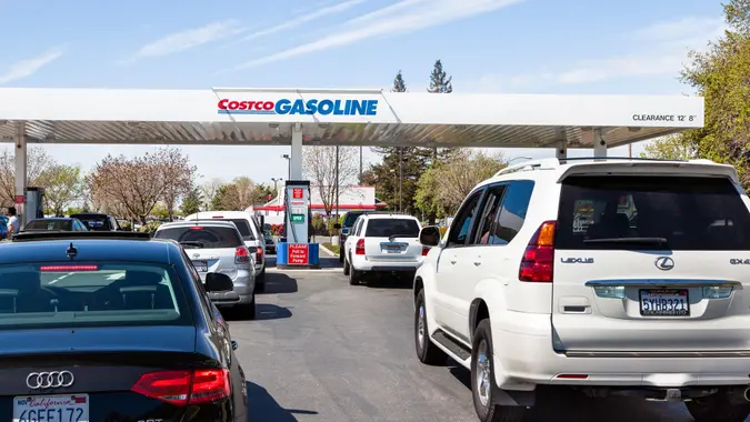 Rancho Cordova, California, USA - April 5, 2011: Vehicles waiting in multiple lines for the gasoline at Costco, members only, gas station.