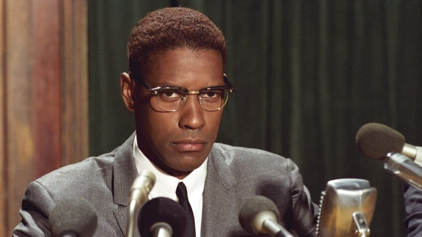 Photo by Warner Bros/Largo International/Kobal/REX/Shutterstock Denzel Washington Malcolm X - 1992 Director: Spike Lee Warner Bros/Largo International/40 Acres & A Mule USA