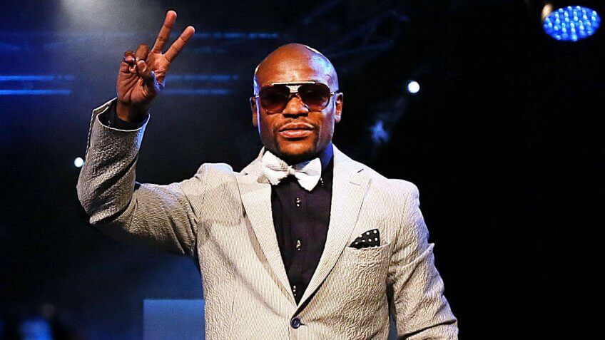 Photo by The Times/REX/Shutterstock (3520780i)Boxing champion Floyd Mayweather during a fundraising event at Emperors Palace in JohannesburgFloyd Mayweather visit to South Africa - 17 Jan 2014The undefeated boxing champion was in the country for a six-day tour to promote local boxing.
