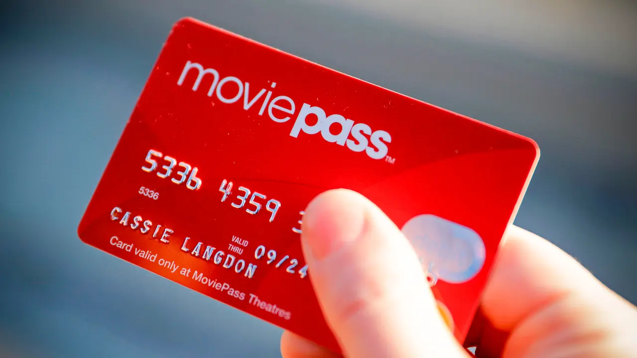 Photo by Darron Cummings/AP/REX/ShutterstockCassie Langdon holds her MoviePass card outside AMC Indianapolis 17 theatre in Indianapolis.