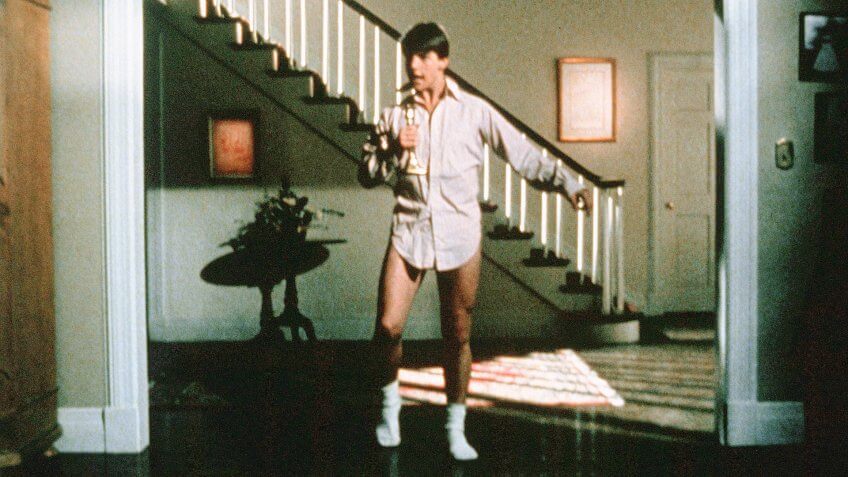 Photo by Warner Bros/Kobal/REX/Shutterstock (5883482t) Tom Cruise Risky Business - 1983 Director: Paul Brickman Warner Bros USA Scene Still