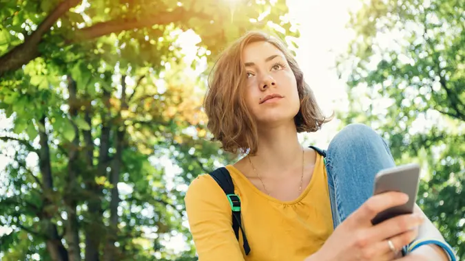 Woman dressed in yellow t-shirt