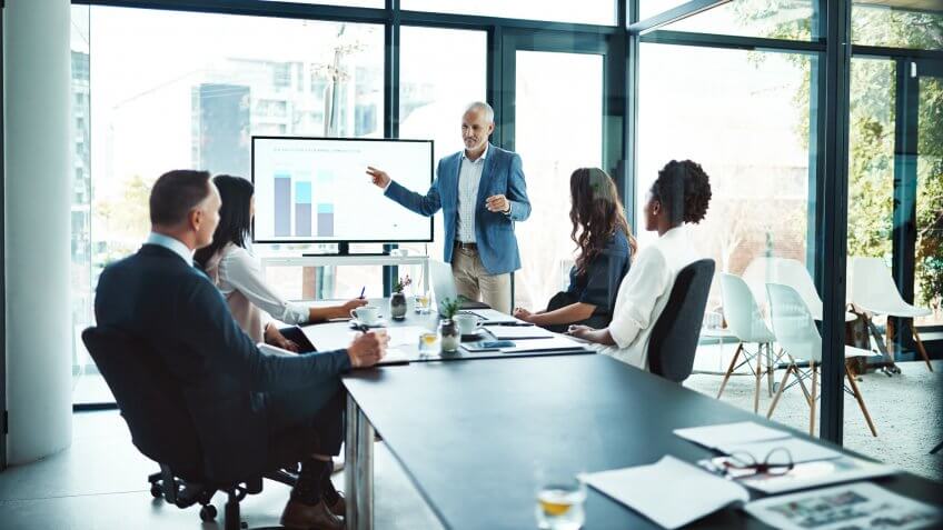 Cropped shot of a businessman giving a presentation in a boardroom.