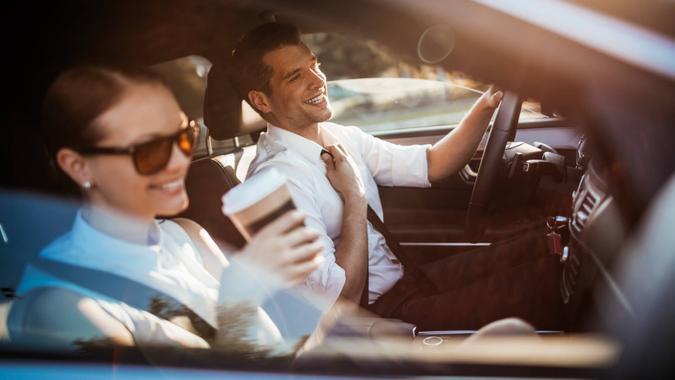 Close up of a Businessman driving a car.