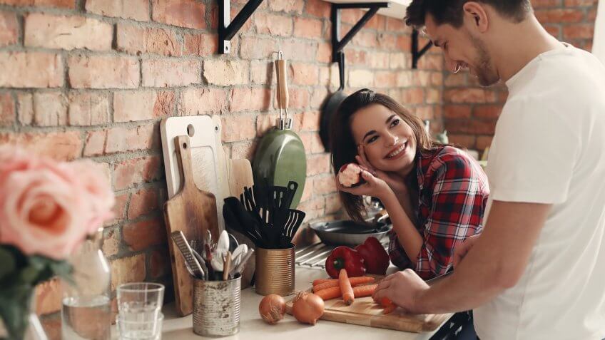 Lovely couple in the kitchen.