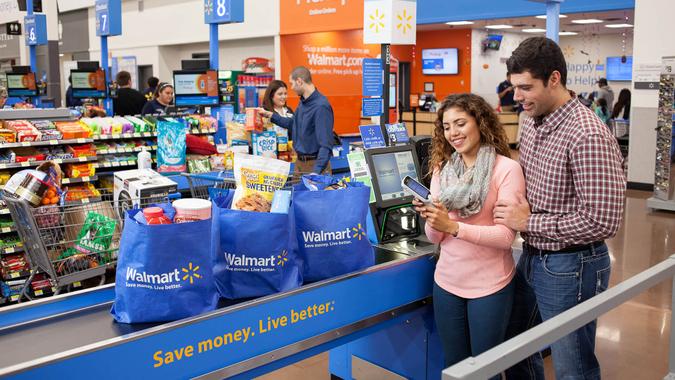 couple checking out in Walmart store