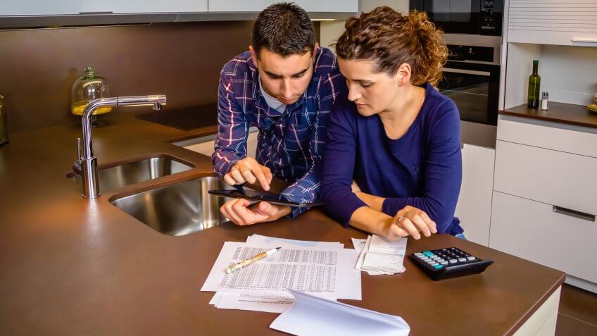couple reviewing finances at home