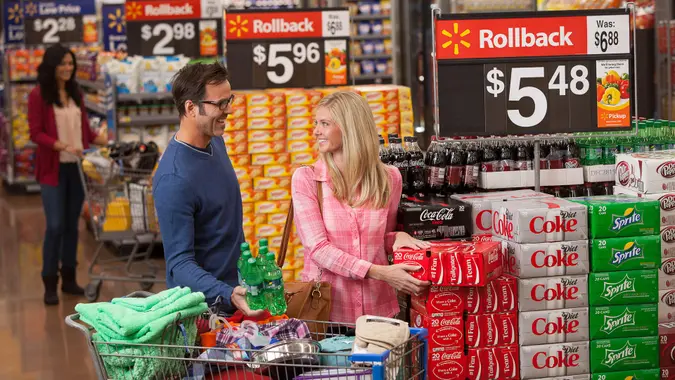 couple shopping in Walmart grocery store