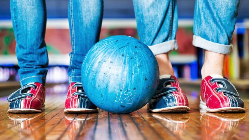 couple with blue bowling ball