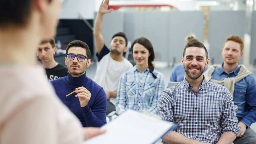 coworkers attending leadership seminar