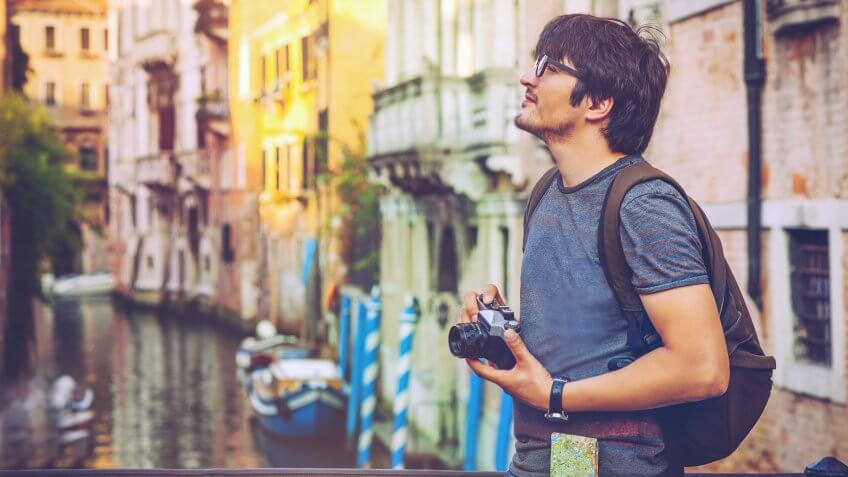 Young man travelling in Venice, Italy.