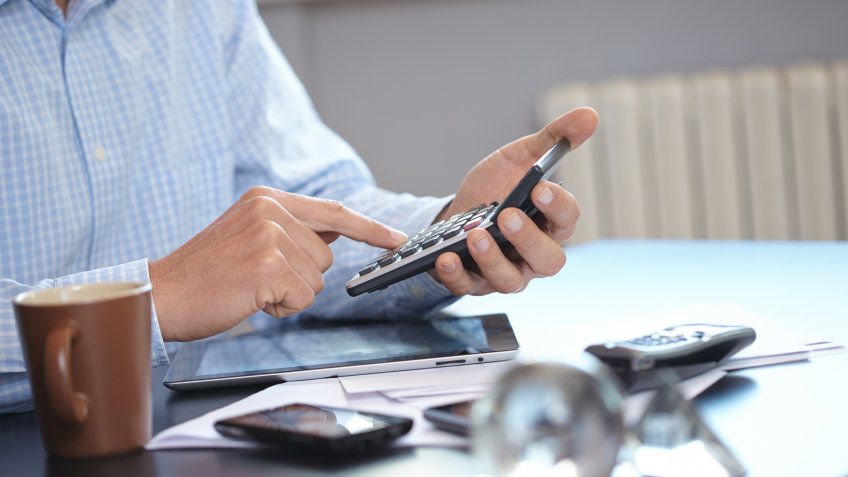 man with calculator