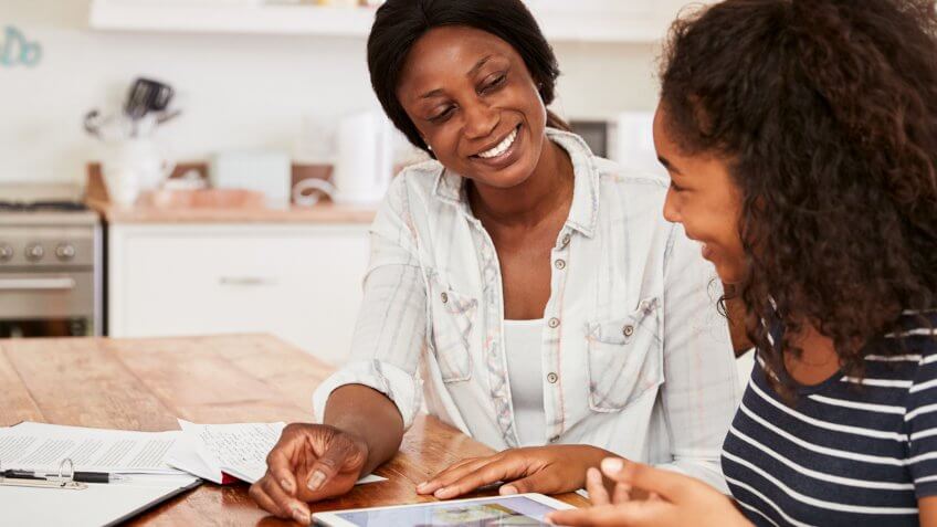 mom talking to daughter about money