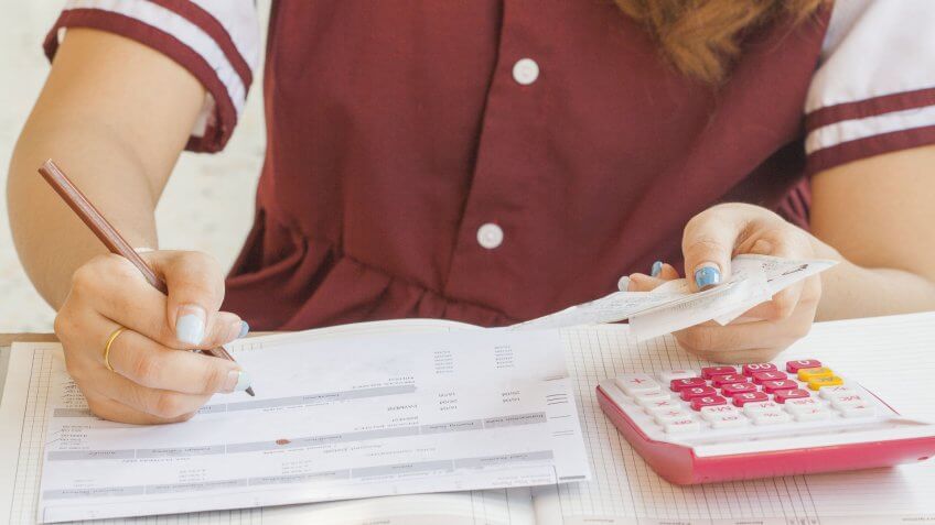 woman paying her bills