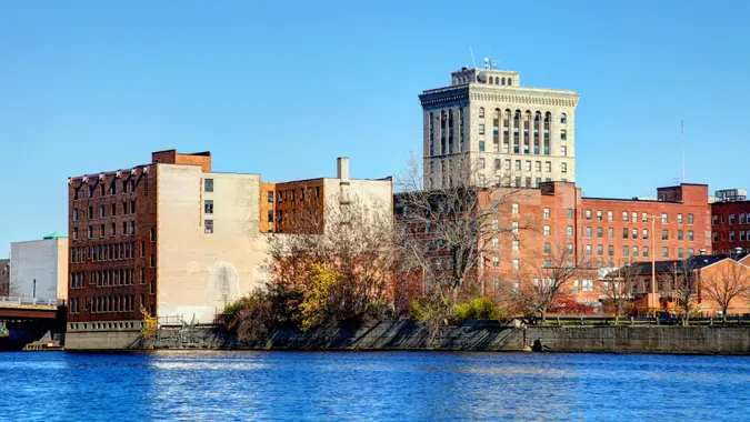 Saginaw Michigan skyline along the banks of the Saginaw River.