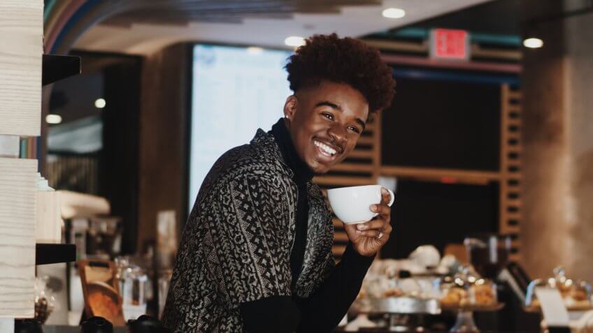 Barista enjoying a cup of coffee in Connecticut