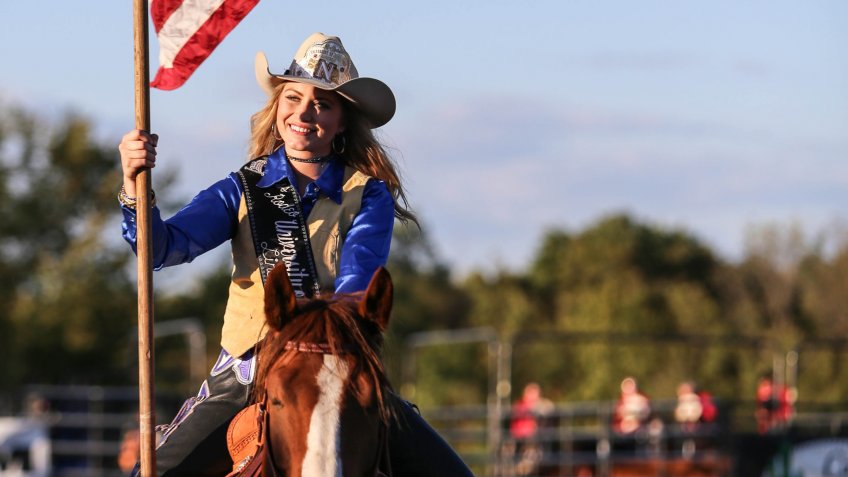Cowgirl riding a horse in Idaho