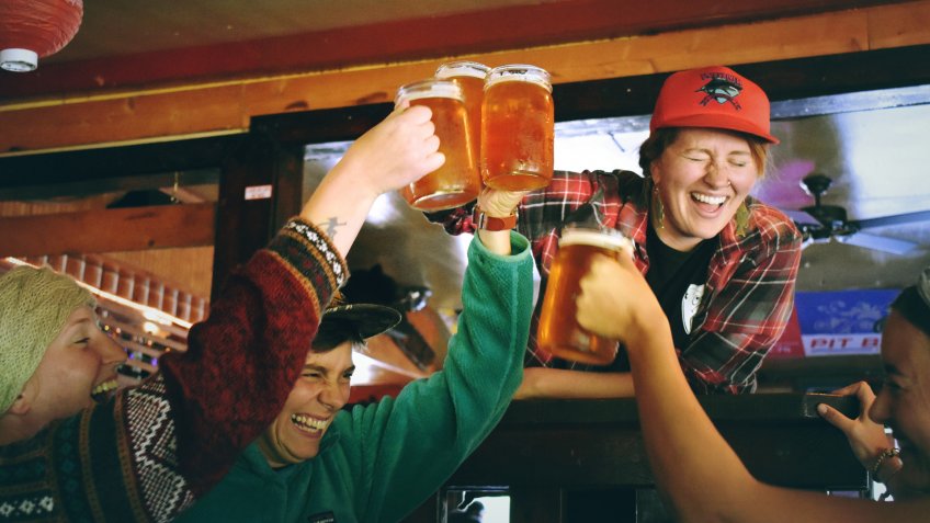 Friends at happy hour in a bar