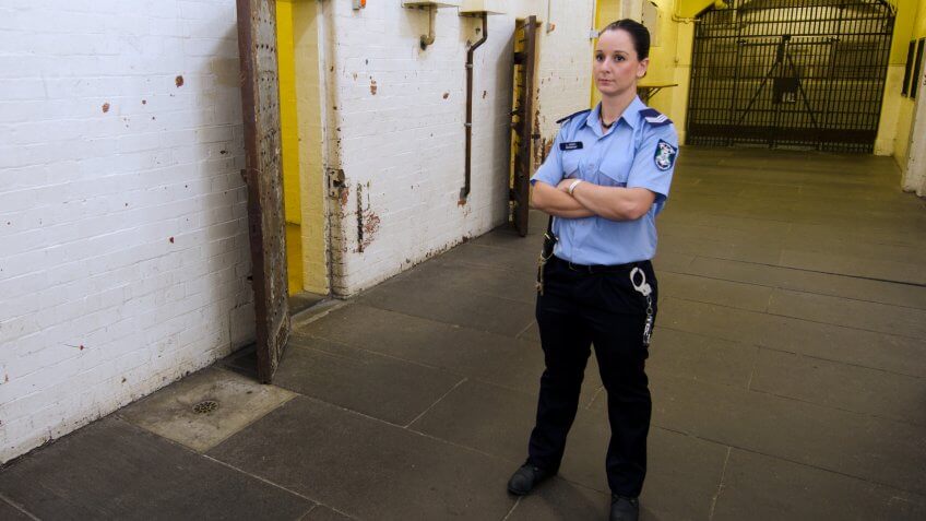 MELBOURNE - APR 11 2014:Jailer at the Old Melbourne Gaol, As of 2010, the gaol is recognized as Victoria's oldest surviving penal establishment, and attracts approximately 140,000 visitors per year.