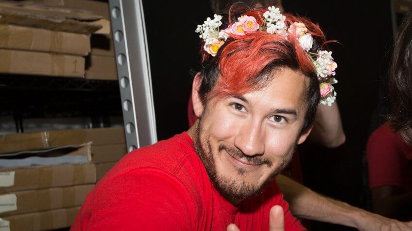 Voice over artist and YouTube personality Markiplier signs autographs.