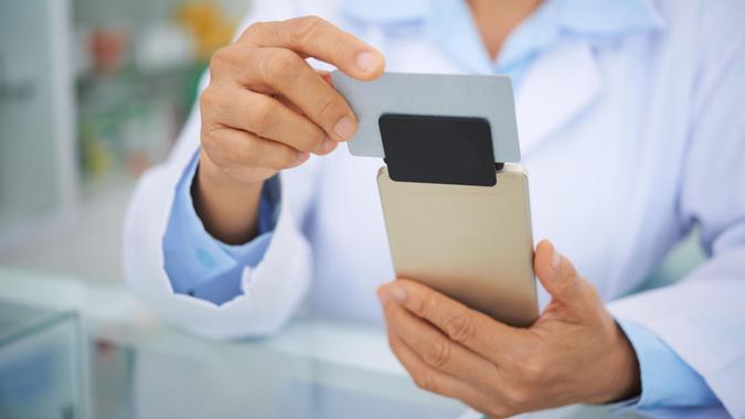 Mobile credit card reader shutterstock_462743404