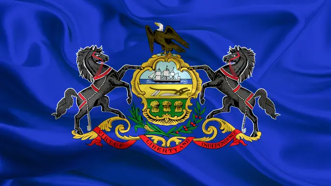 Waving Pennsylvania State flag.