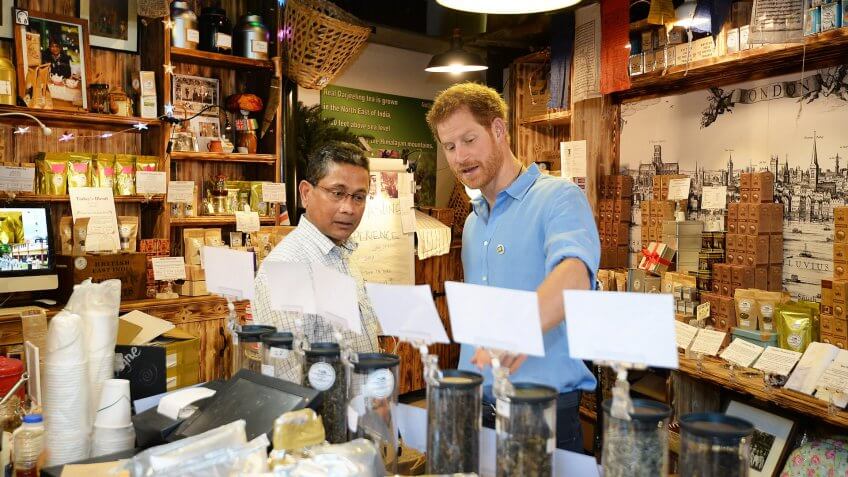 Mandatory Credit: Photo by REX/Shutterstock (8869405e)Prince Harry meets stallholder Ratan Mandal in his Tea shop during a visit to Borough Market in London which has opened yesterday for the first time since the London Bridge terrorist attackPrince Harry visit to Borough Market, London, UK - 15 Jun 2017.