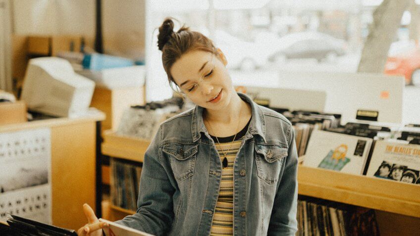 Woman looking through records in a store in Washington
