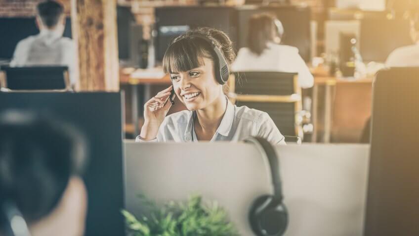 Call center worker accompanied by her team.