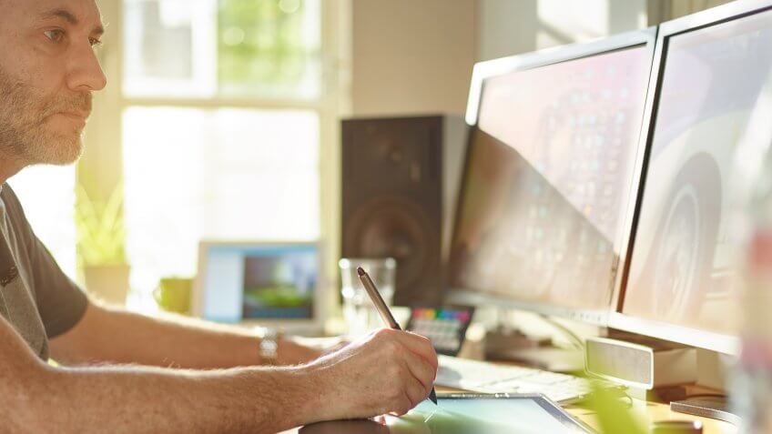 motion graphic artist using pen tablet