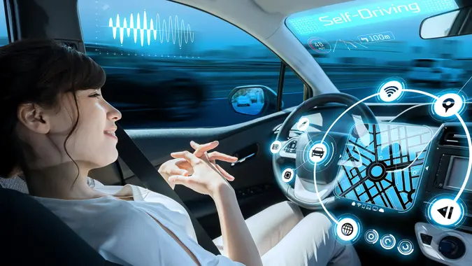 relaxed woman in autonomous car.