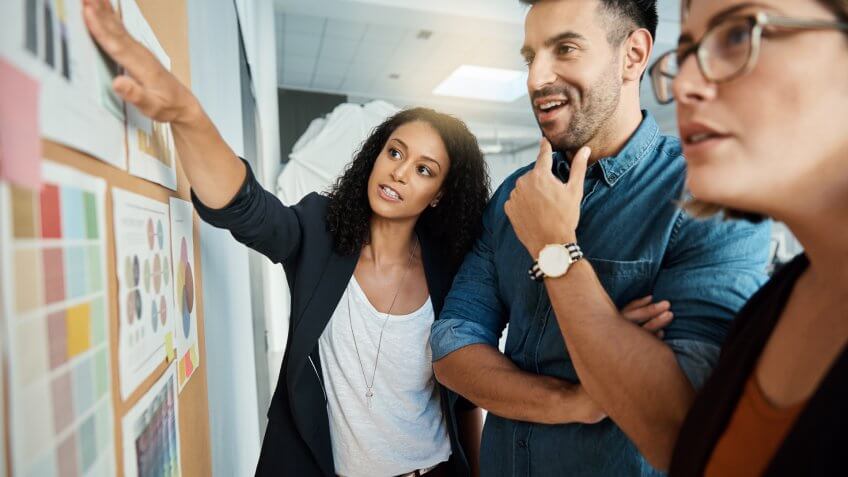 Shot of a group of colleagues having a brainstorming session in a modern office.