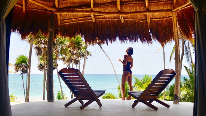 woman in tropical hotel destination
