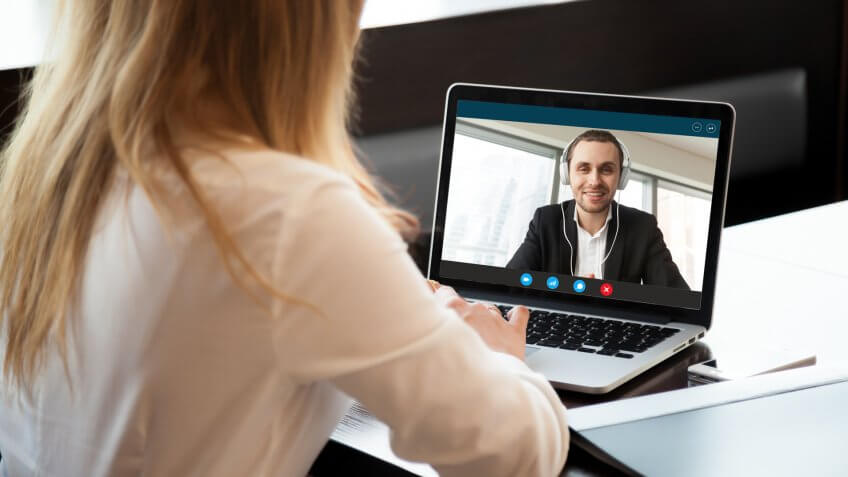 woman watching online consultant