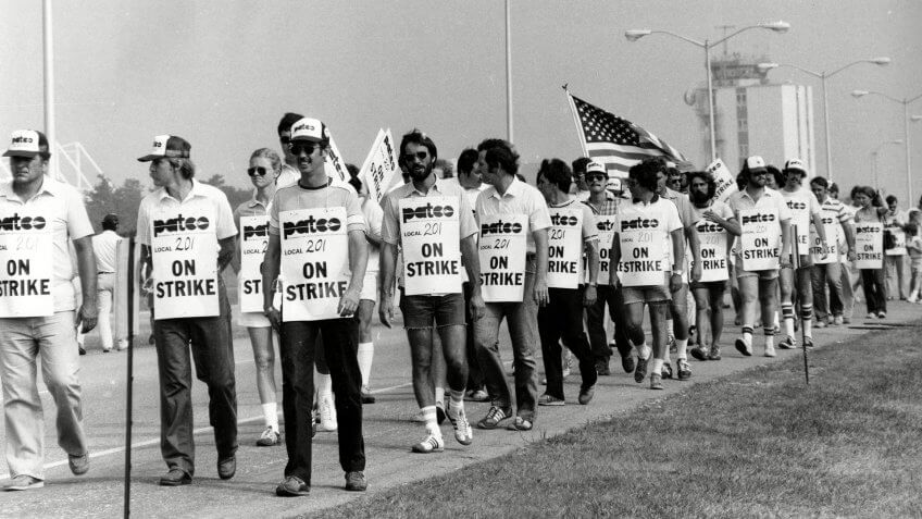 Mandatory Credit: Photo by DAVID HANDSCHUH/AP/REX/Shutterstock (6536424a)Striking air traffic controllers walk the picket line at the New York air route traffic control center in Ronkonkoma, N.