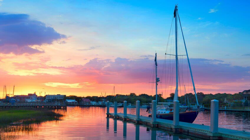 Sunrise Over A Docked Sailboat In Charleston South Carolina.