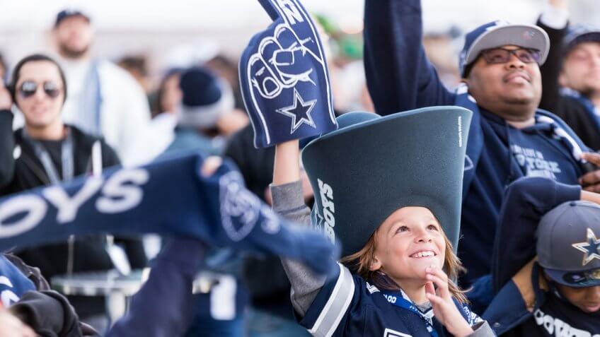 Dallas Cowboys fans cheering at ATT Stadium