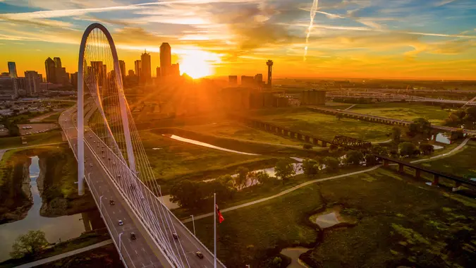 Dallas Texas golden sunrise over Margaret Hunt Hill Bridge.