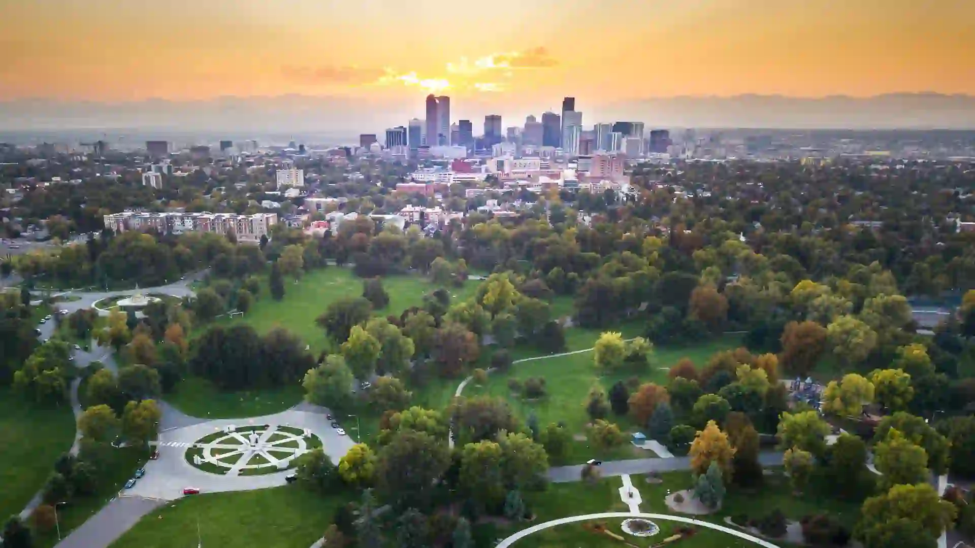 Sunset over Denver cityscape, aerial view from the city park.