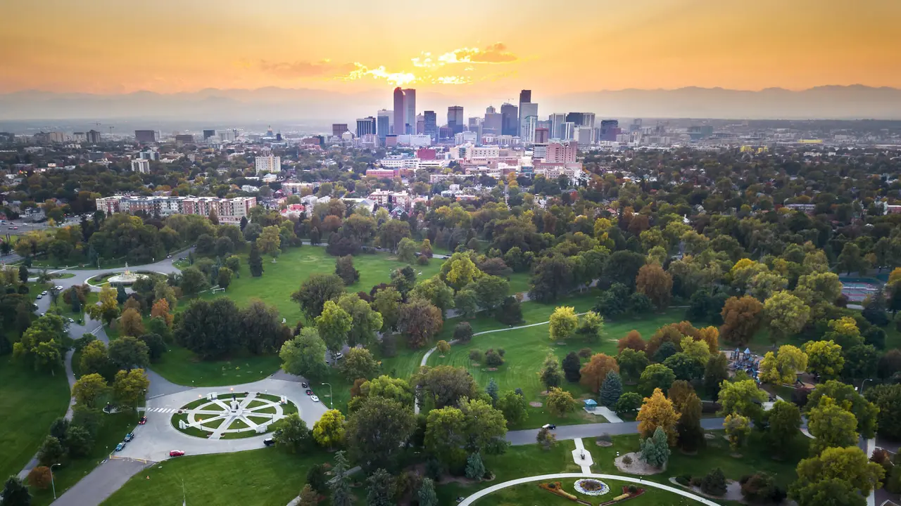 Sunset over Denver cityscape, aerial view from the city park.