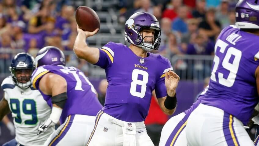 Mandatory Credit: Photo by Bruce Kluckhohn/AP/REX/Shutterstock (9807572bb)Minnesota Vikings quarterback Kirk Cousins (8) throws a pass during the first half of an NFL preseason football game against the Seattle Seahawks, in MinneapolisSeahawks Vikings Football, Minneapolis, USA - 24 Aug 2018.