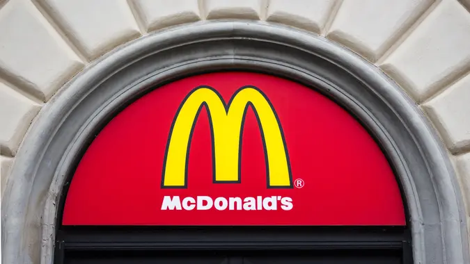 McDonald's fast food chain restaurant sign above an entrance