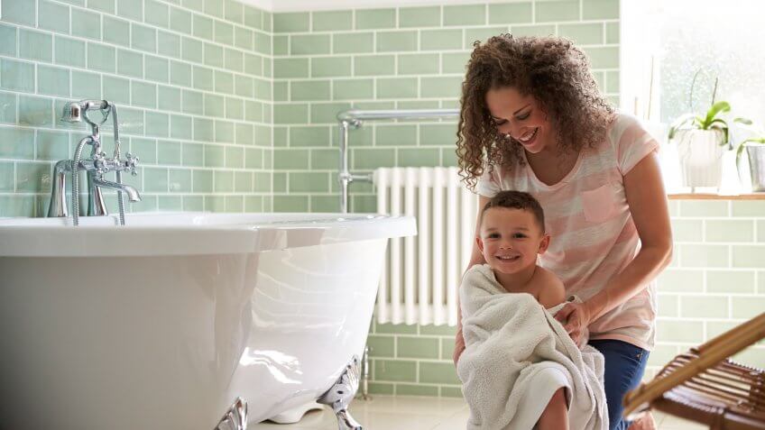 Mother Drying Son With Towel After Bath.