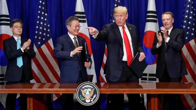 Mandatory Credit: Photo by Evan Vucci/AP/REX/Shutterstock (9893646y)President Donald Trump gestures after he and South Korean President Moon Jae-In participated in a signing ceremony for the United States-Korea Free Trade Agreement at the Lotte New York Palace hotel during the United Nations General Assembly, in New YorkTrump, New York, USA - 24 Sep 2018.
